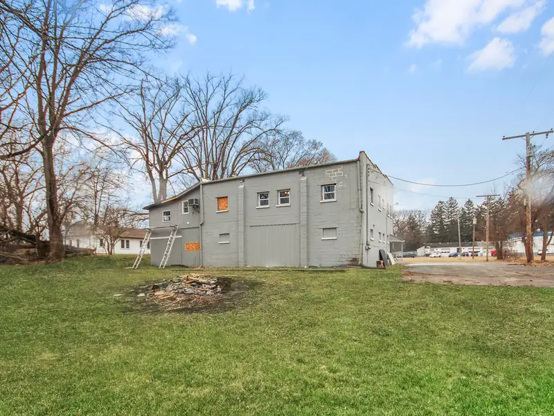 Mixed-use Two Unit Building with Remodeled Three Bedroom Apartment in Prime Location
