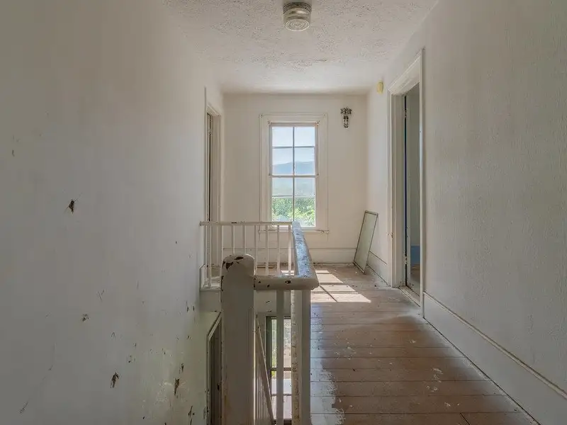 Classic American Foursquare Home in Need of Restoration with Detached Garage