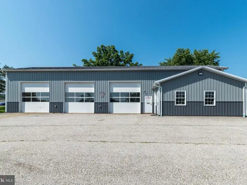 Auto Repair Shop with Residential Income Opportunity in Prime Location