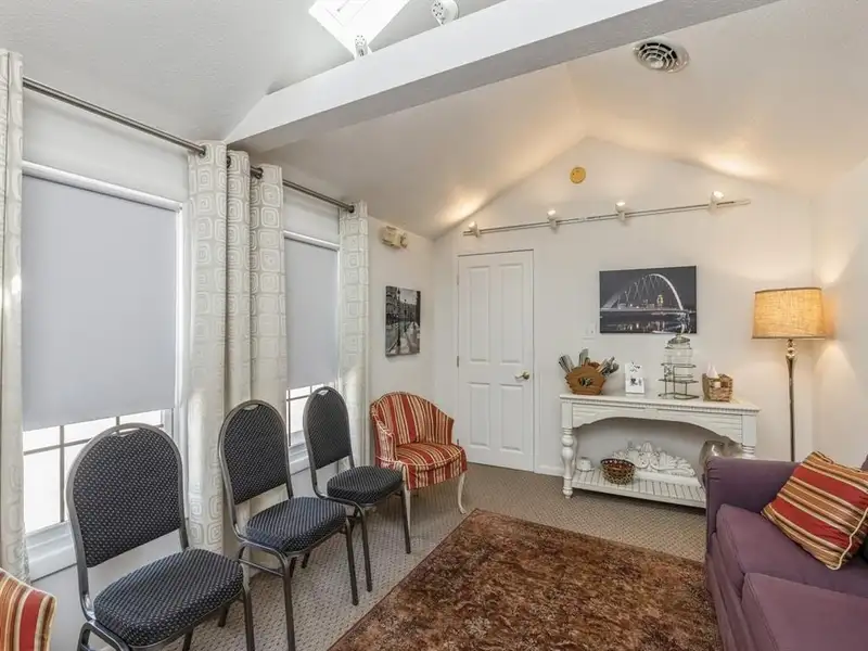 Vintage 4-bedroom Beaverdale Brick Home with Office Suites in Historic Valley Junction
