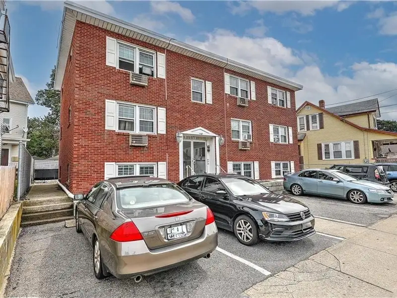 6-unit Brick Apartment Building in Pawtucket's Darlington Neighborhood with Off-street Parking