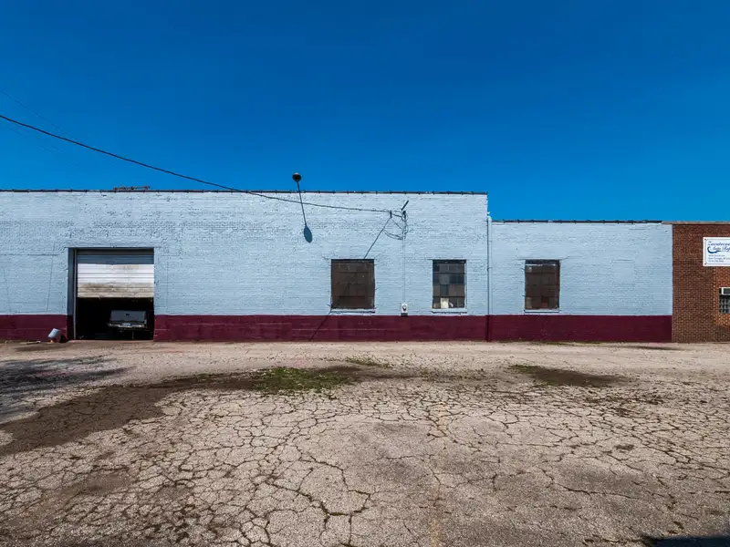 Mixed-use Property with 1-bedroom Apartment in Well-maintained Building