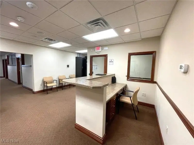 Well-maintained Two-story Brick Building with Retail and Workshop Space in Ne Location