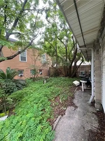 Architecturally Significant Triplex in Coveted New Orleans Neighborhood with Renovation Potential