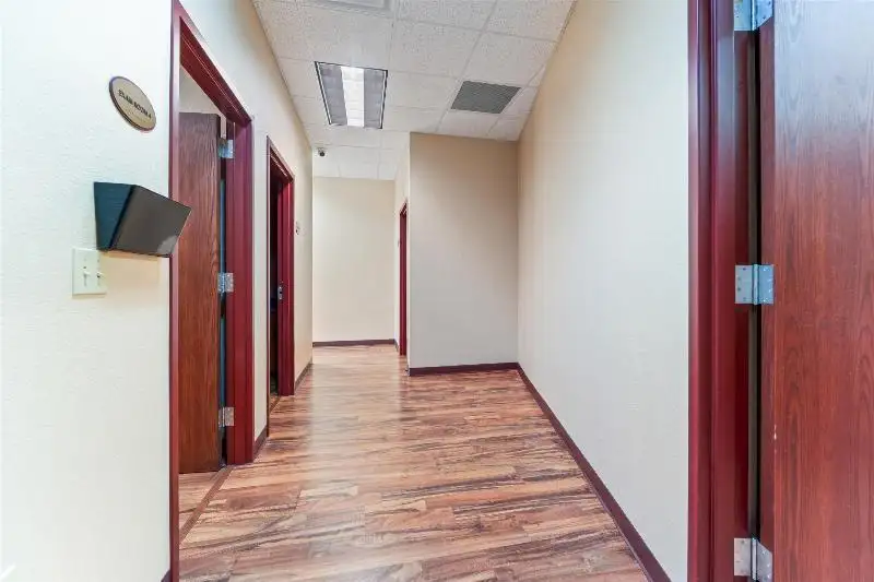 Versatile Commercial Condo for Sale Near Hwy 151 & 41 with Multiple Offices and Amenities