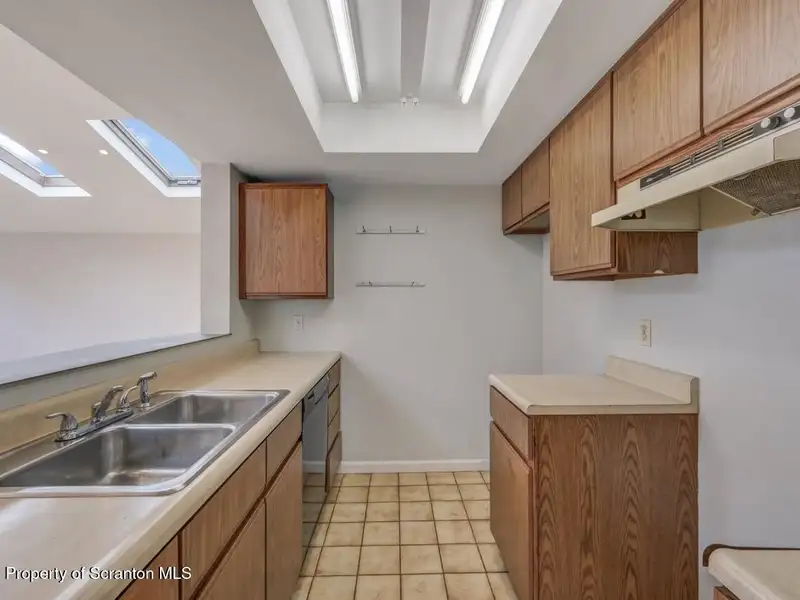 Mixed-use Property in Throop: 7-bay Garage and Updated 2-bedroom Apartment