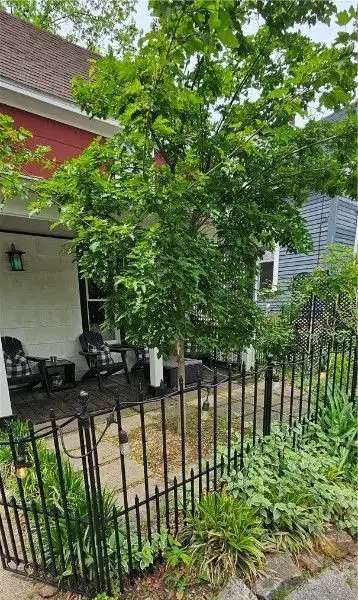 Charming Airbnb Cottage on Historic Loop with Upgrades and Large Entertaining Deck