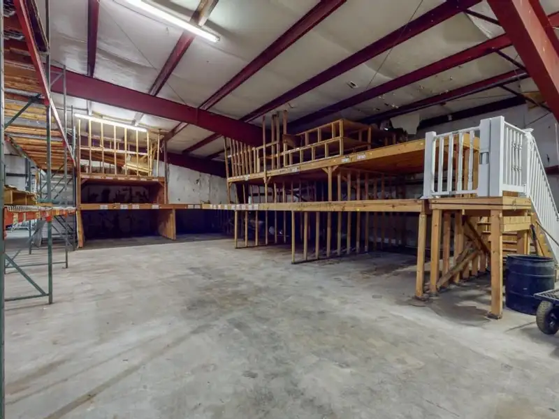 Commercial Property on Busy Highway - 2.1 Acres, 31,000 Sq Ft with Offices and Roll-up Doors