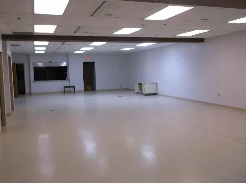 14,000 Sf Two-story Building in Omro with 20+ Rooms and Parking Lot Available