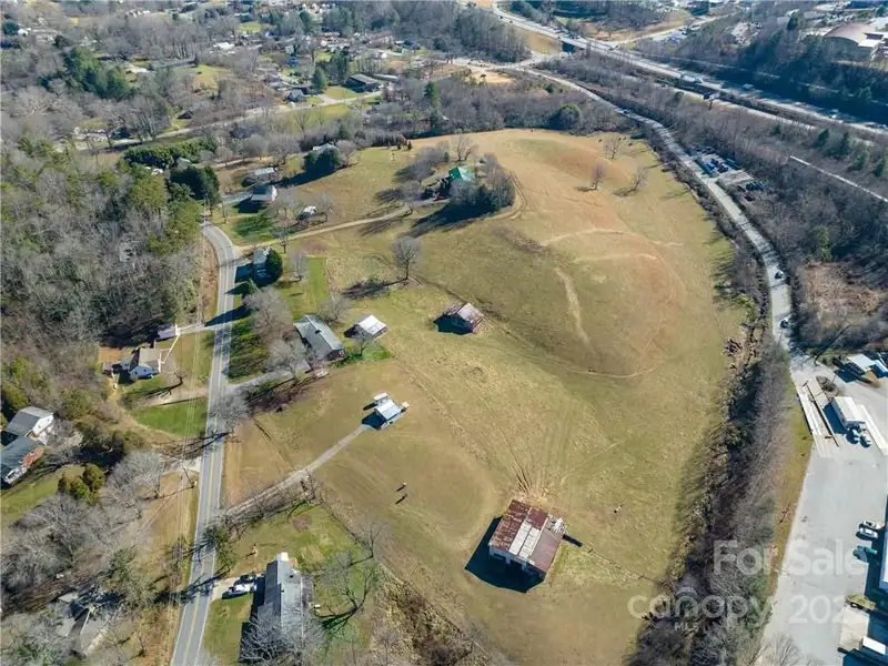 10.81 Acres of Unrestricted Land for Commercial Development Near Major Amenities