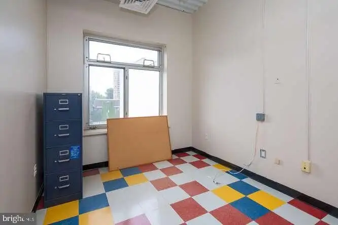 Versatile 6,000 Sq Ft Commercial Space in Prime Location with Parking Potential