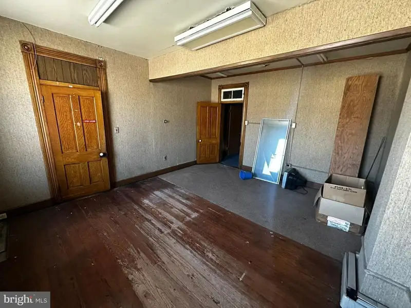 Large Commercial Building with Unique Floor Plan and Adjacent City-owned Lot for Sale