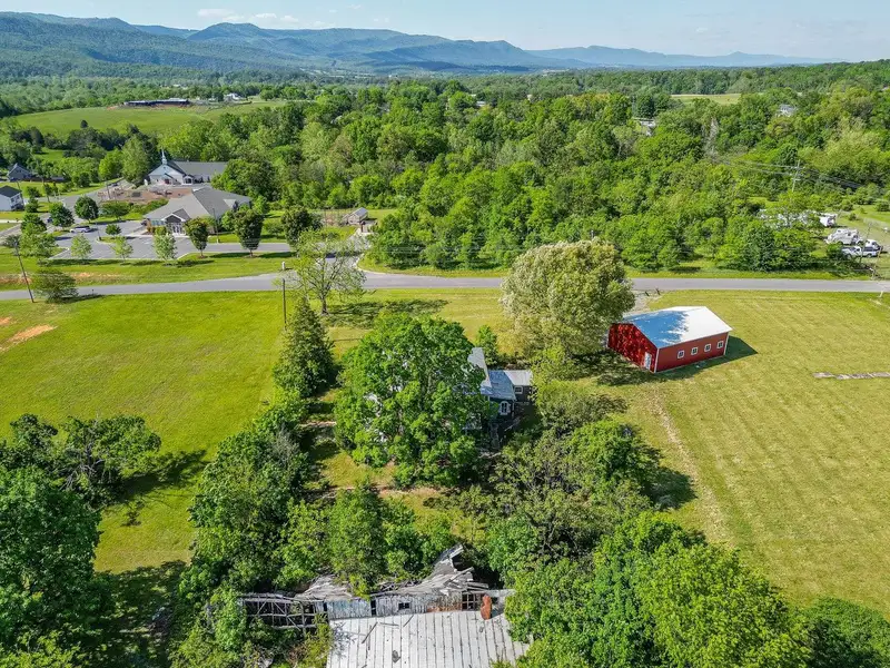 Classic American Foursquare Home in Need of Restoration with Detached Garage