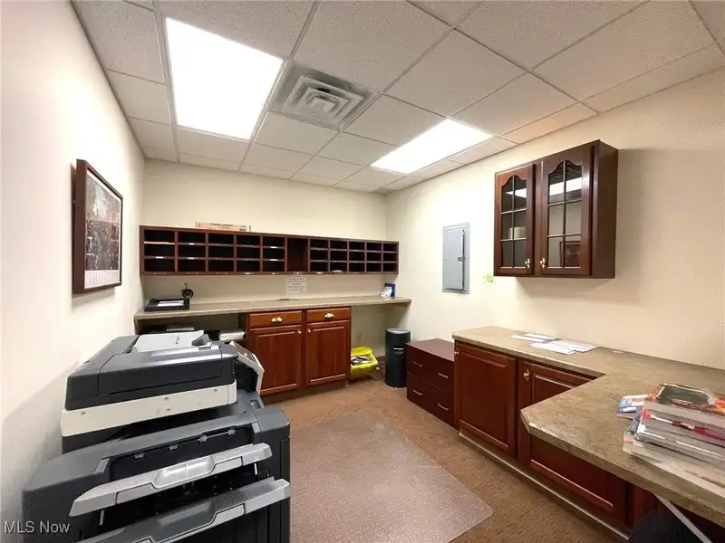 Well-maintained Two-story Brick Building with Retail and Workshop Space in Ne Location