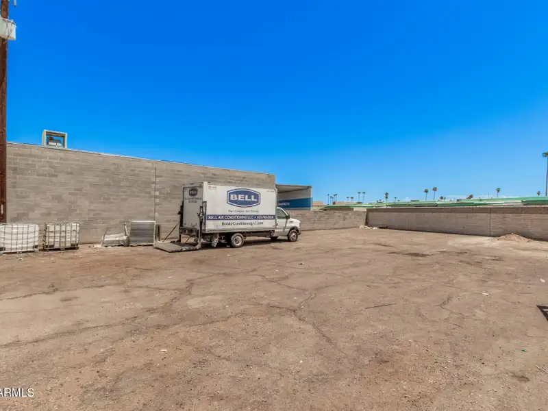 Versatile Commercial Property with Two Buildings and Ample Parking in Prime Location
