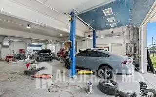 Turnkey Automotive Business with Car Dealership, Mechanic & Auto Body Shop in Prime Location