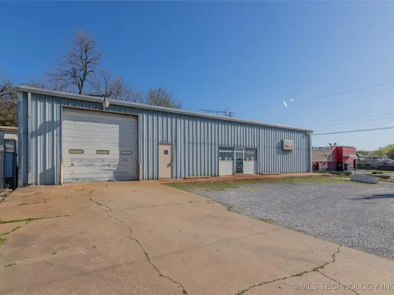 Versatile Former Machine Shop in Prime Downtown Sand Springs Location