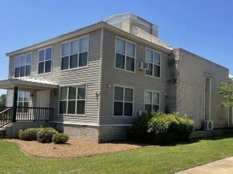 Two-level Commercial Unit with 26 Living/office Spaces in Re-zoned R4 Area
