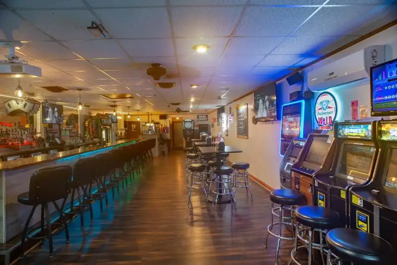 Turnkey Bar for Sale in Redgranite with Established Customer Base and Ample Parking