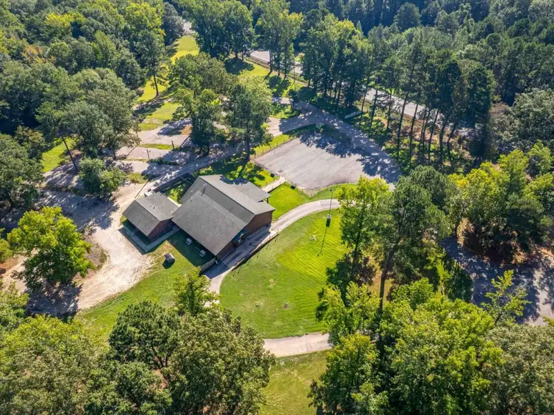 Established Log Cabin Liquor Store for Sale on Highway 70 with Drive-through Access