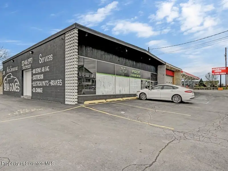 Mixed-use Building with Retail Space and Parking for Sale in Prime Location