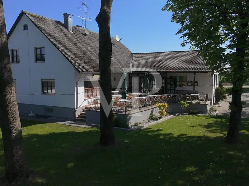Versatile Residential and Commercial Building with Restaurant in Münchsmünster