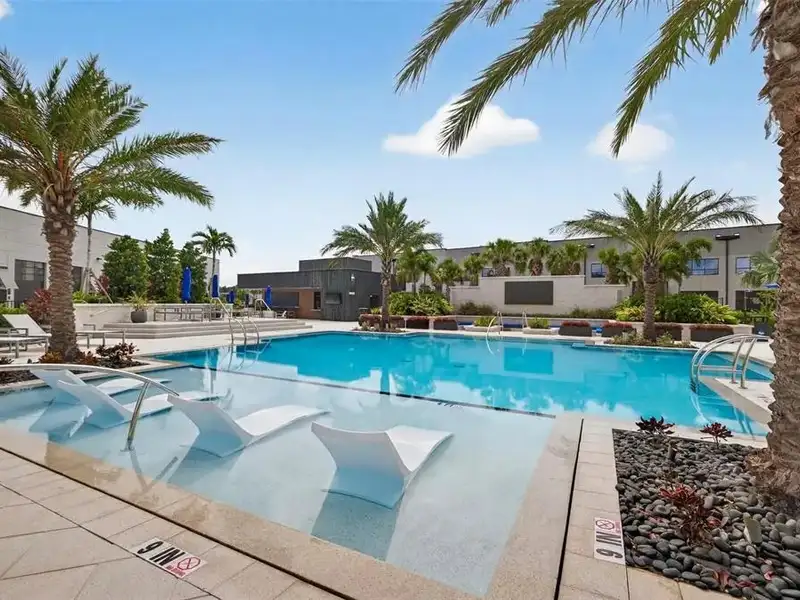 Exclusive Balcony Unit at the Motor Enclave with Private Garage and Racetrack Views