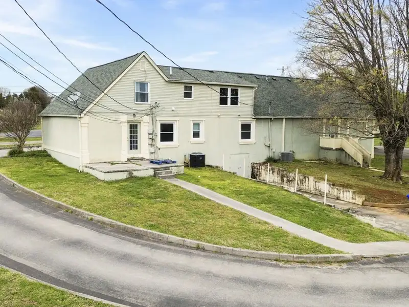 Versatile 4,305 Sq Ft Office Building with Apartment on Highway 11e