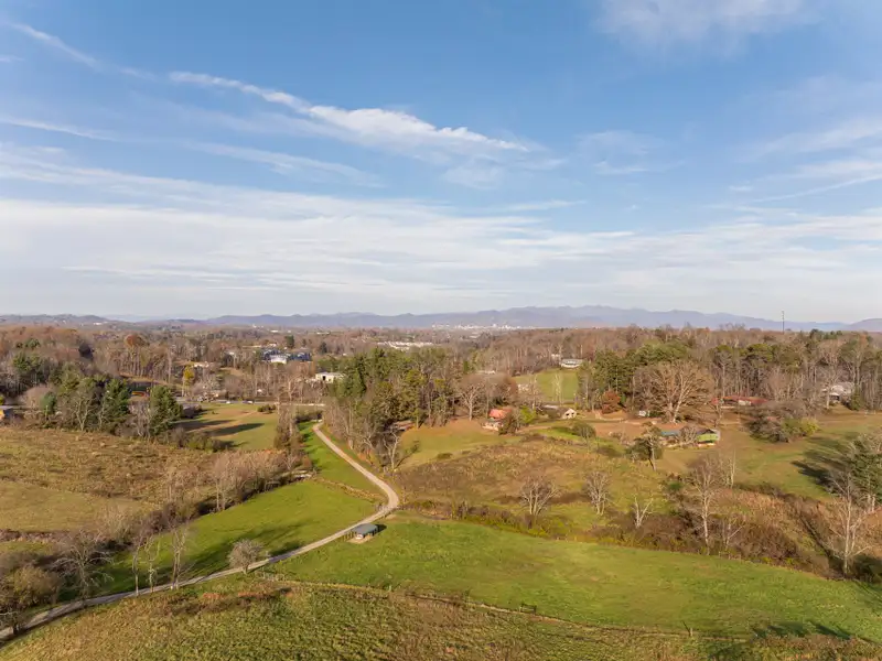 Unique 268-acre Asheville Property with Mountain Views, Homestead, and Horse Facilities