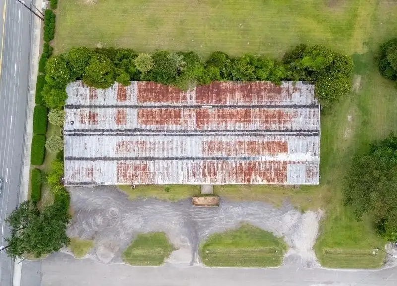 Class C Warehouse with Renovation Potential on 1.82 Acres in Prime Location