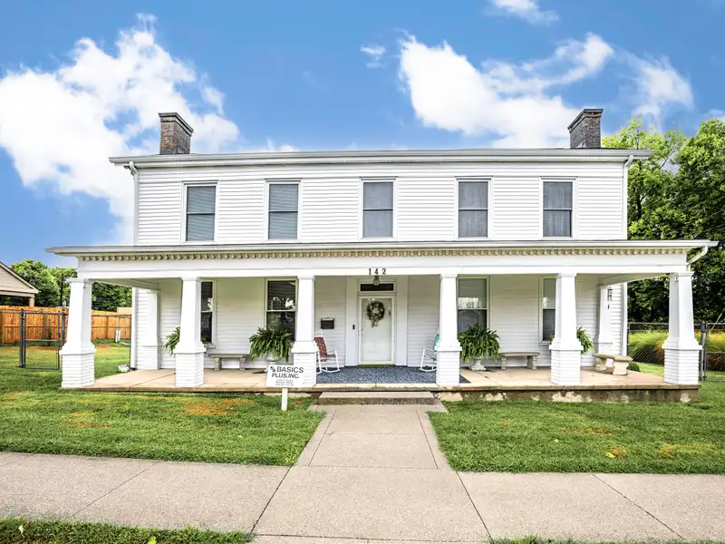 Historic 1850s Two-story Home in Central Business District of Versailles