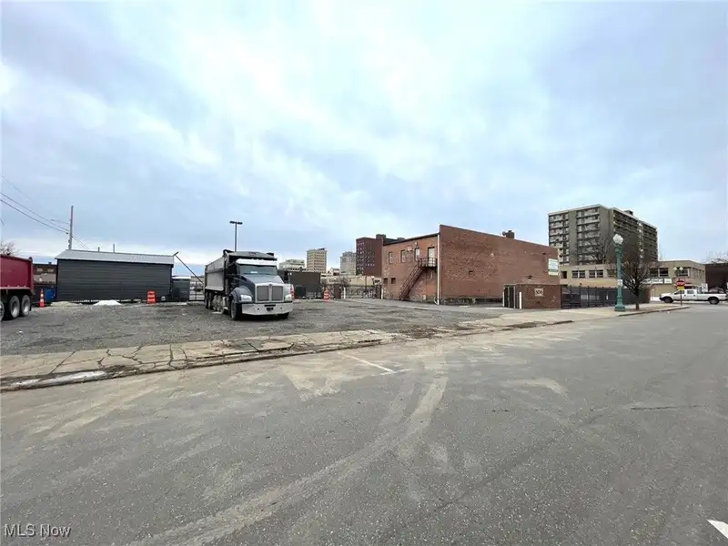 Well-maintained Two-story Brick Building with Retail and Workshop Space in Ne Location