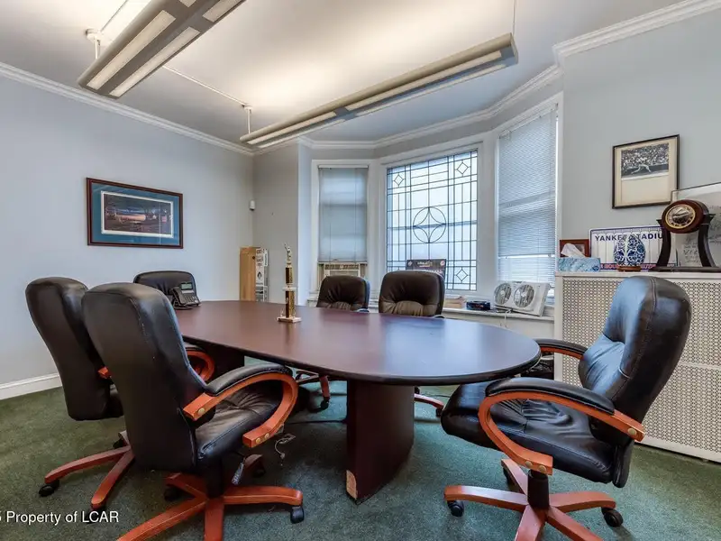 Versatile Office Building in Central Kingston with Multiple Offices and Ample Parking