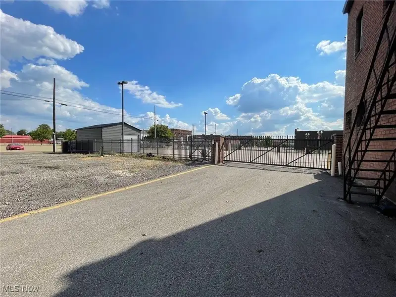 Well-maintained Two-story Brick Building with Retail and Workshop Space in Ne Location
