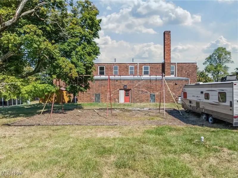 Versatile Two-story Brick Building on Almost 3 Acres with Gym and Classrooms