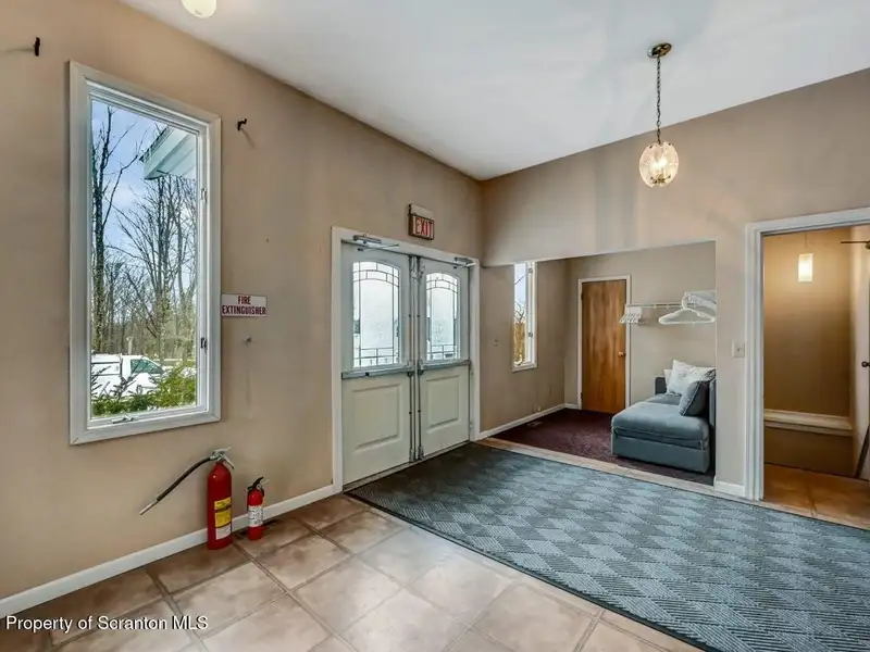 Versatile Former Church Building in Peaceful Location with Ample Parking and Creative Potential