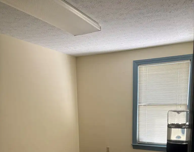 Versatile 2352 Sq. Ft. Brick Ranch Office Building in Virginia with Ample Parking