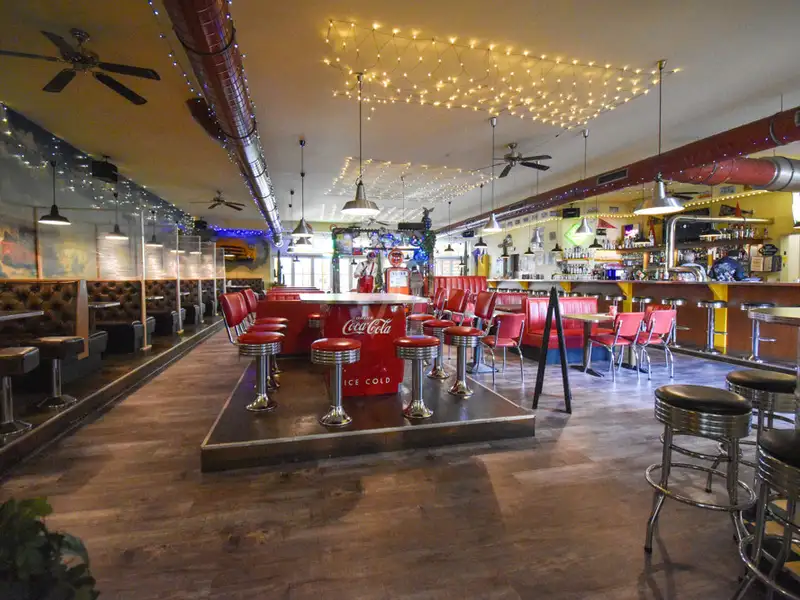 Fully Equipped Restaurant and Discotheque in Prime Volkach Location with Outdoor Seating