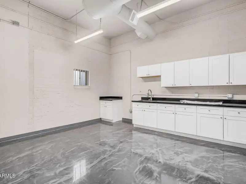 Versatile Commercial Property with Two Buildings and Ample Parking in Prime Location