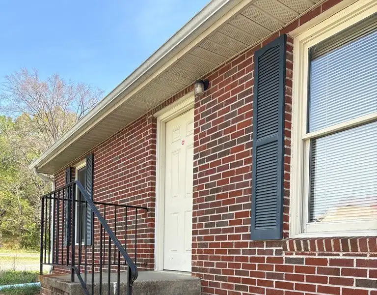 Versatile 2352 Sq. Ft. Brick Ranch Office Building in Virginia with Ample Parking
