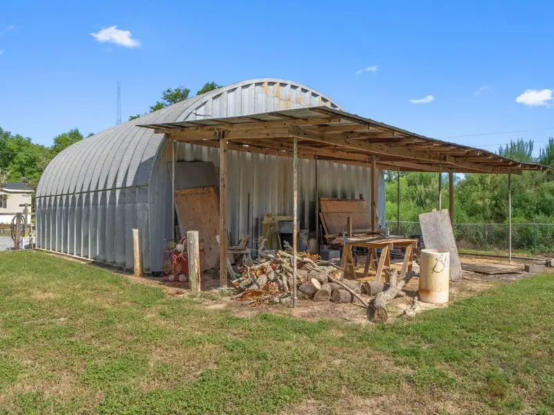 30x30 Enclosed Quonset Building with Pole Barn and Storage on Hwy 98