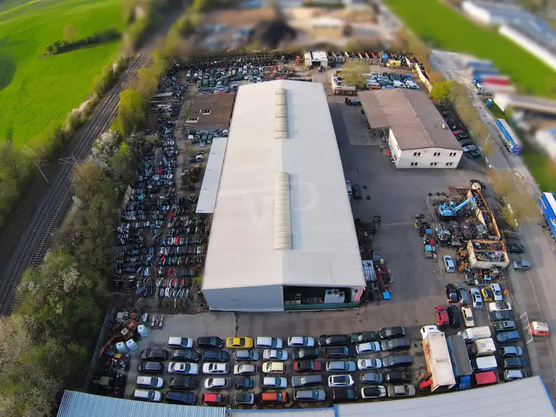 Versatile Industrial Property with Halls, Offices, and Open Space in Prime Location