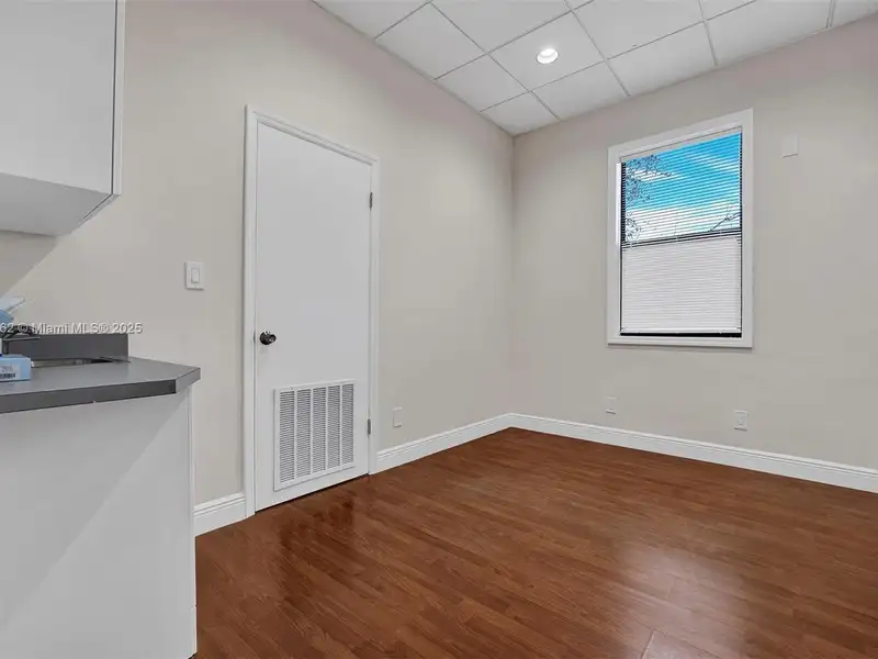 Renovated Office Building with 24 Surface Parking Spaces, On-site Management
