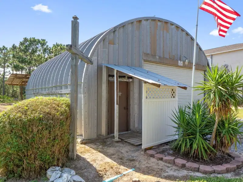 30x30 Enclosed Quonset Building with Pole Barn and Storage on Hwy 98