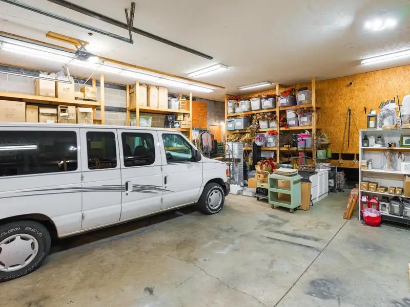 Prime Commercial Building in Downtown Reynoldsburg with Parking and Industrial Garage