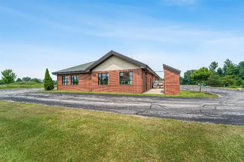 Versatile Commercial Condo for Sale Near Hwy 151 & 41 with Multiple Offices and Amenities