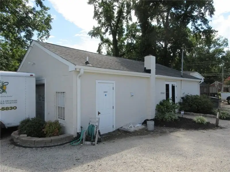Turnkey Fully Leased Office Building with Garages in Prime Langley Afb Location