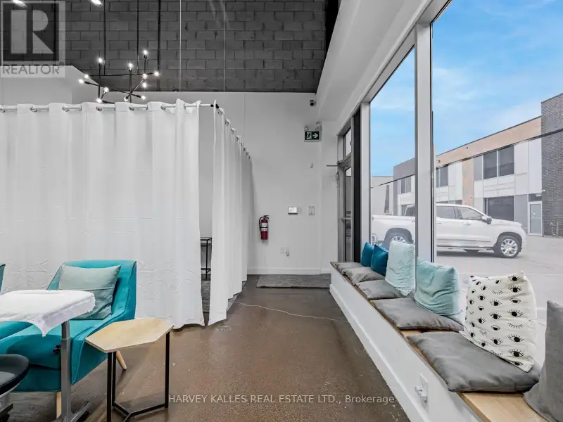 Fully Leased Commercial Condo in Prime Location on the Queensway