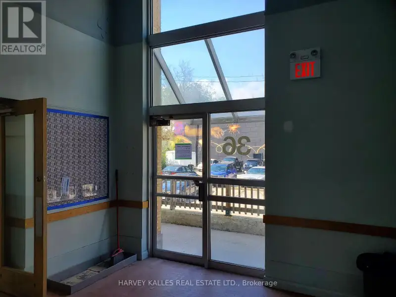 Historic Open Concept Commercial Space in Downtown Simcoe with Parking