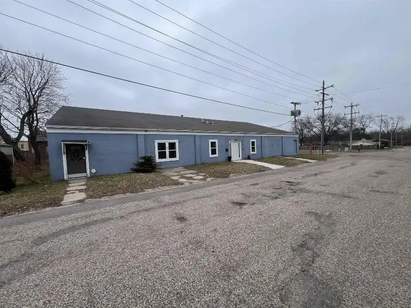 Versatile Mixed-use Property with Office Space and Storage in Residential Area